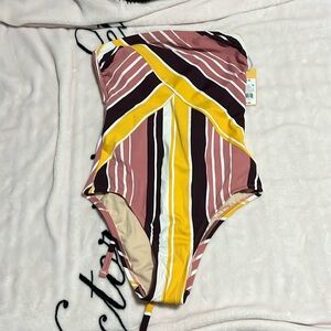 New with tags Kona Sol S Women’s strapless one-piece bathing suit. Multicolor